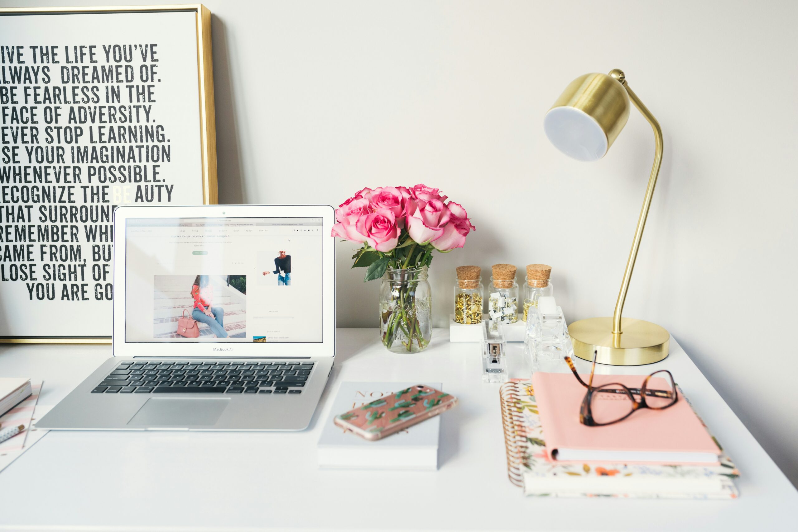 laptop on a desk featuring an e-commerce website